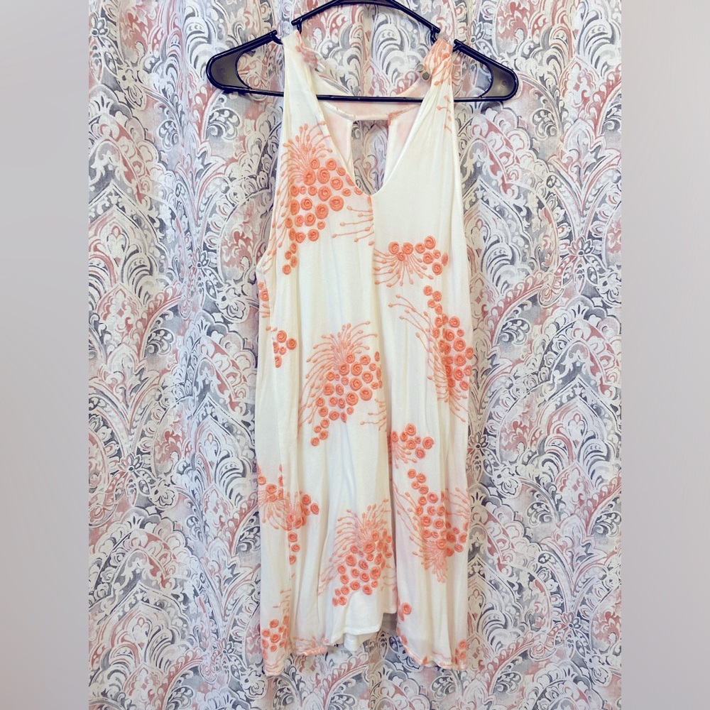 White neck strap dress with peach floral print
